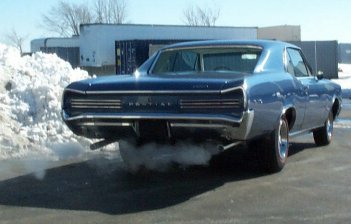 66 GTO next to snow