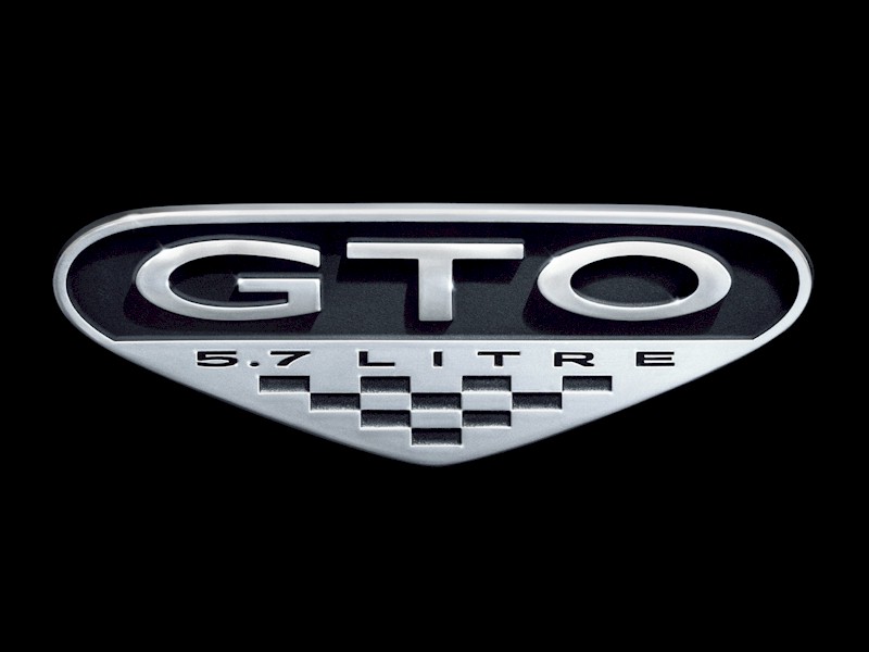gto wallpaper. the 2004 GTO 5.7L emblem.